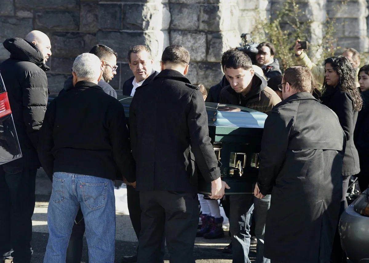 Pallbearers carry the casket of homicide victim Valerie Reyes into her funeral mass at St. Gabriel's Church in New Rochelle, New York, on Feb. 12, 2019.  (Tyler Sizemore/Heast Connecticut Media)