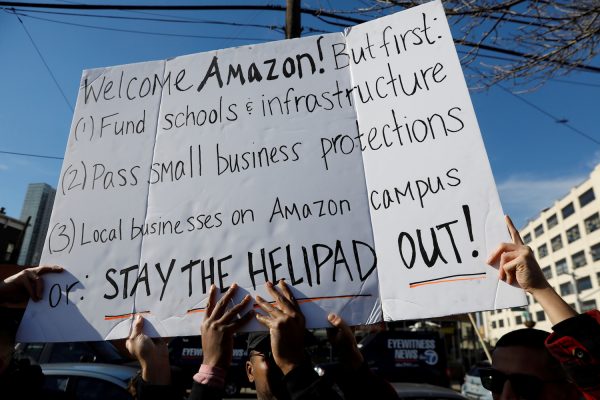 Demonstrators gather to protest Amazon's new location