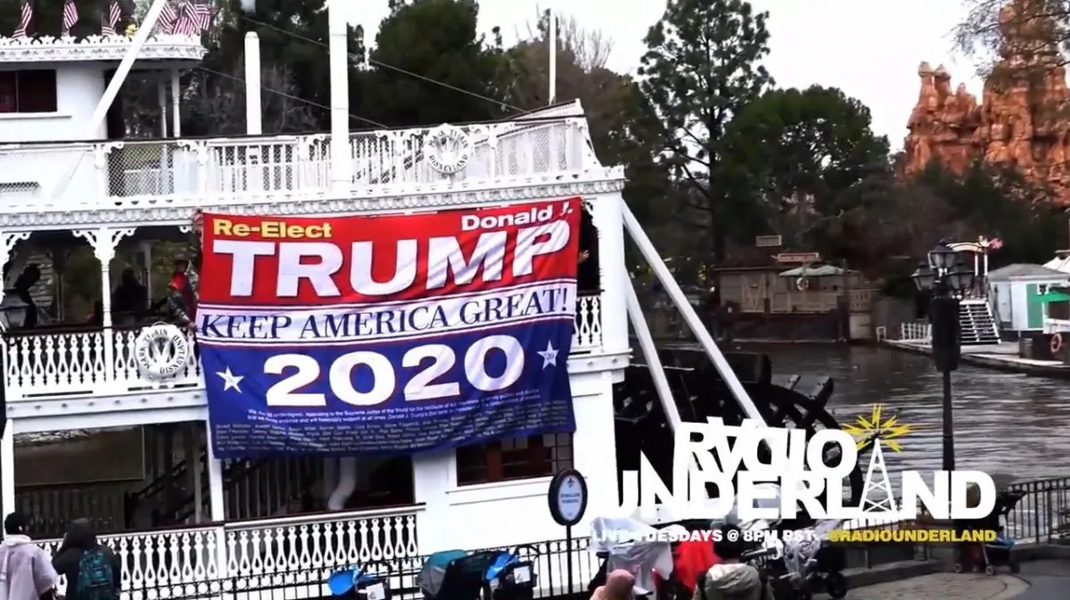 A banner reading "Re-elect Trump" and "Keep America Great!" was unfurled at Disneyland in Anaheim, Calif., on Feb. 13, 2019, leading to the banning of a guest. (Image from Radio Underland YouTube video of incident)
