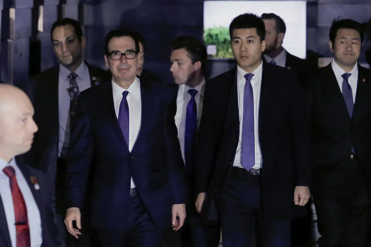 U.S. Treasury Secretary Steven Mnuchin, a member of the U.S. trade delegation to China, leaves a hotel in Beijing for talks with Chinese officials on Feb. 14, 2019. (Thomas Peter/Reuters)