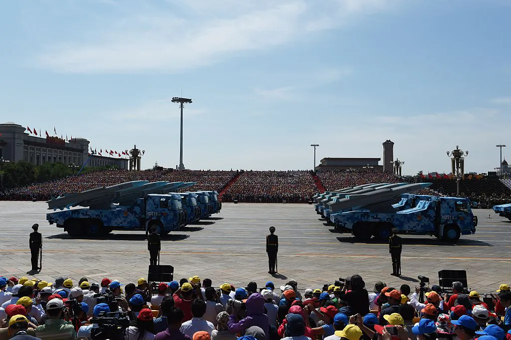 Military vehicles carrying cruise missiles are displayed in a military parade at Tiananmen Square in Beijing on Sept. 3, 2015. (Greg Baker/AFP/Getty Images)