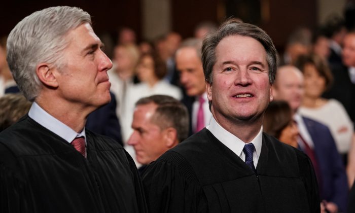 Supreme Court Justices Neil Gorsuch and Brett Kavanaugh attend the State of the Union address in the chamber of the U.S. House of Representatives at the U.S. Capitol Building on February 5, 2019 in Washington, DC. (Doug Mills-Pool/Getty Images)
