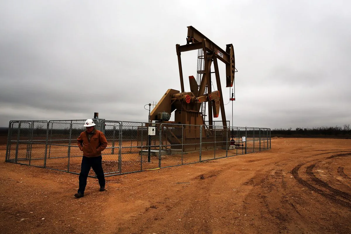 An oil well in the Permian Basin in Garden City, Tex., on Feb. 5, 2015. (Spencer Platt/Getty Images)