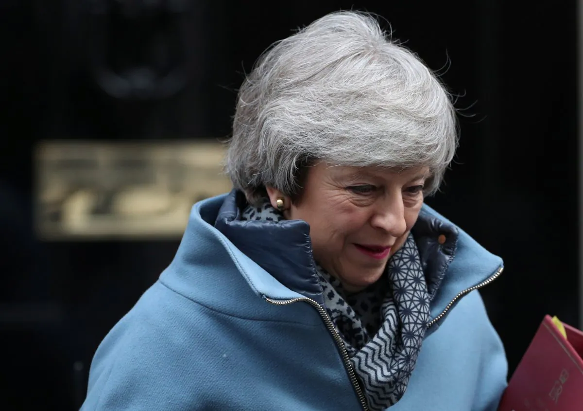 Britain's Prime Minister Theresa May outside Downing Street in London on Feb. 13, 2019. (Hannah McKay/Reuters)