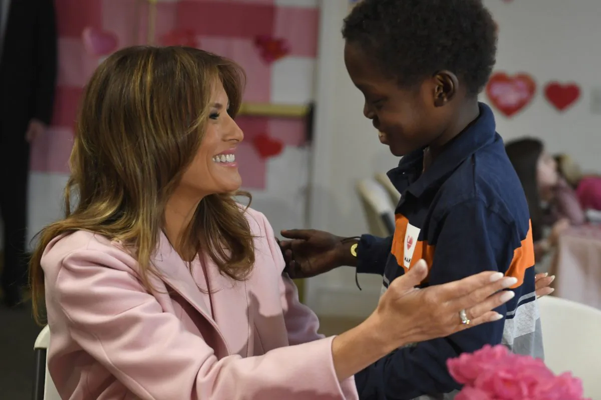 First Lady Melania Trump talks with Amani, 13, of Mombasa, Kenya, during her visit to the National Institutes of Health to see children at the Children's Inn and celebrate Valentine's Day, in Bethesda, Md., on Feb. 14, 2019. (Susan Walsh/AP)