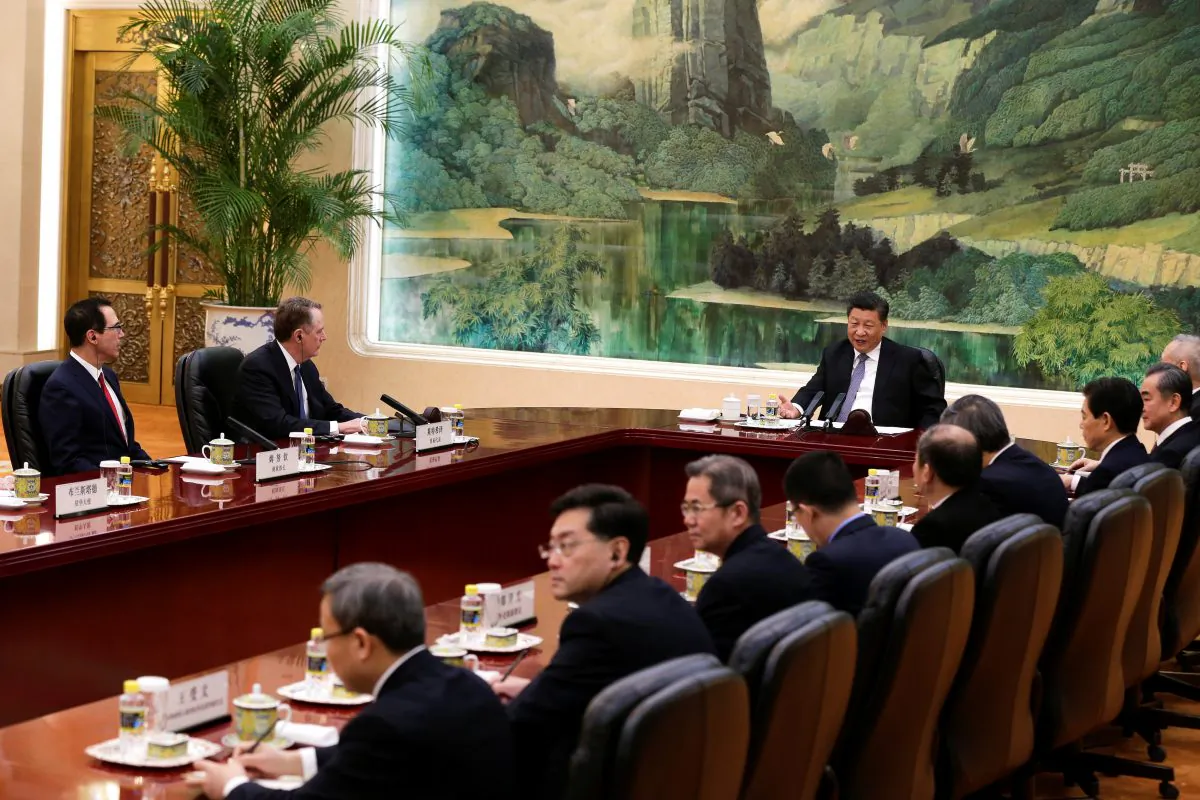 Chinese leader Xi Jinping, speaks as he meets with U.S. Trade Representative Robert Lighthizer, second from left, U.S. Treasury Secretary Steven Mnuchin, left, and Chinese officials at the Great Hall of the People in Beijing on Feb. 15, 2019. (Andy Wong/Pool via Reuters)