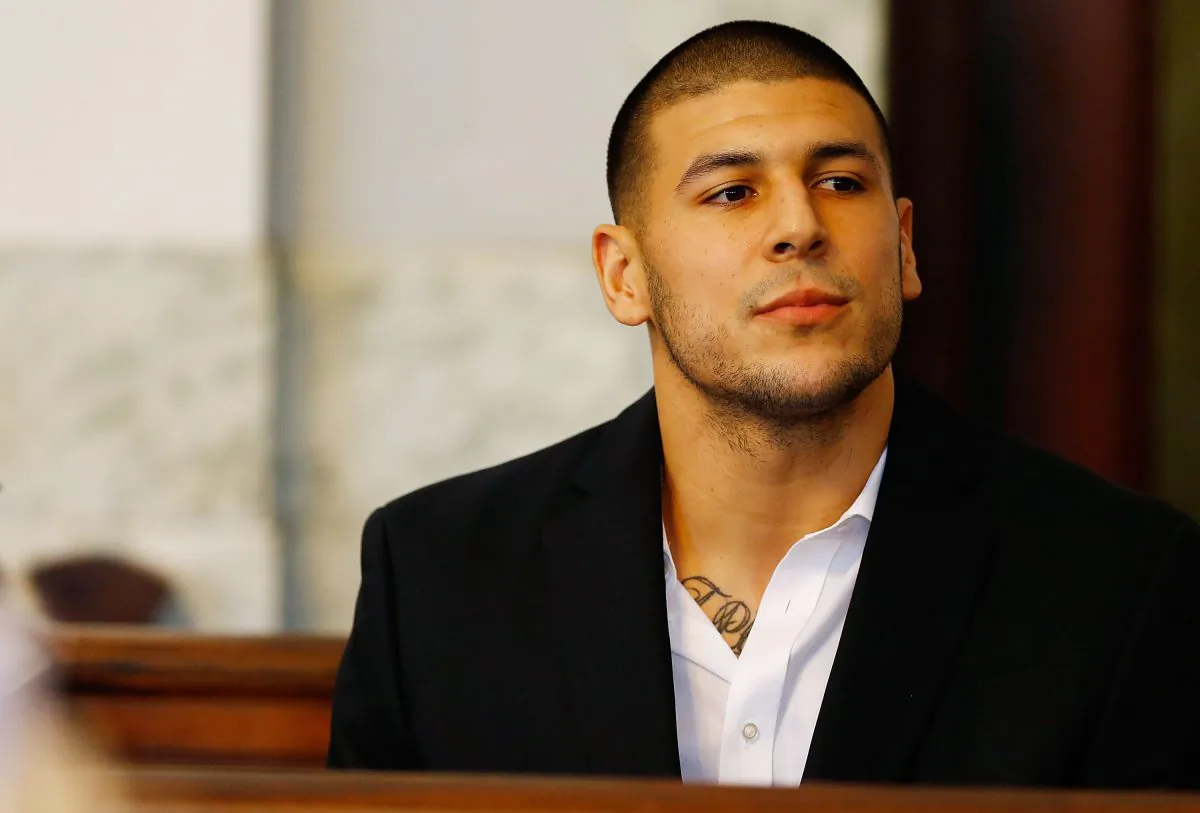 Aaron Hernandez sits in the courtroom of the Attleboro District Court during his hearing in North Attleboro, Mass., on Aug. 22, 2013. (Jared Wickerham/Getty Images)