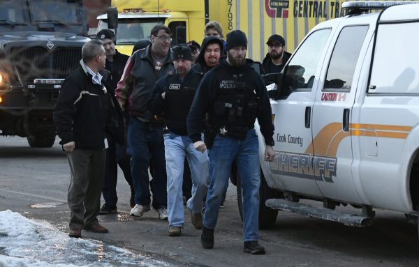Employees Aurora Factory shooting escorted