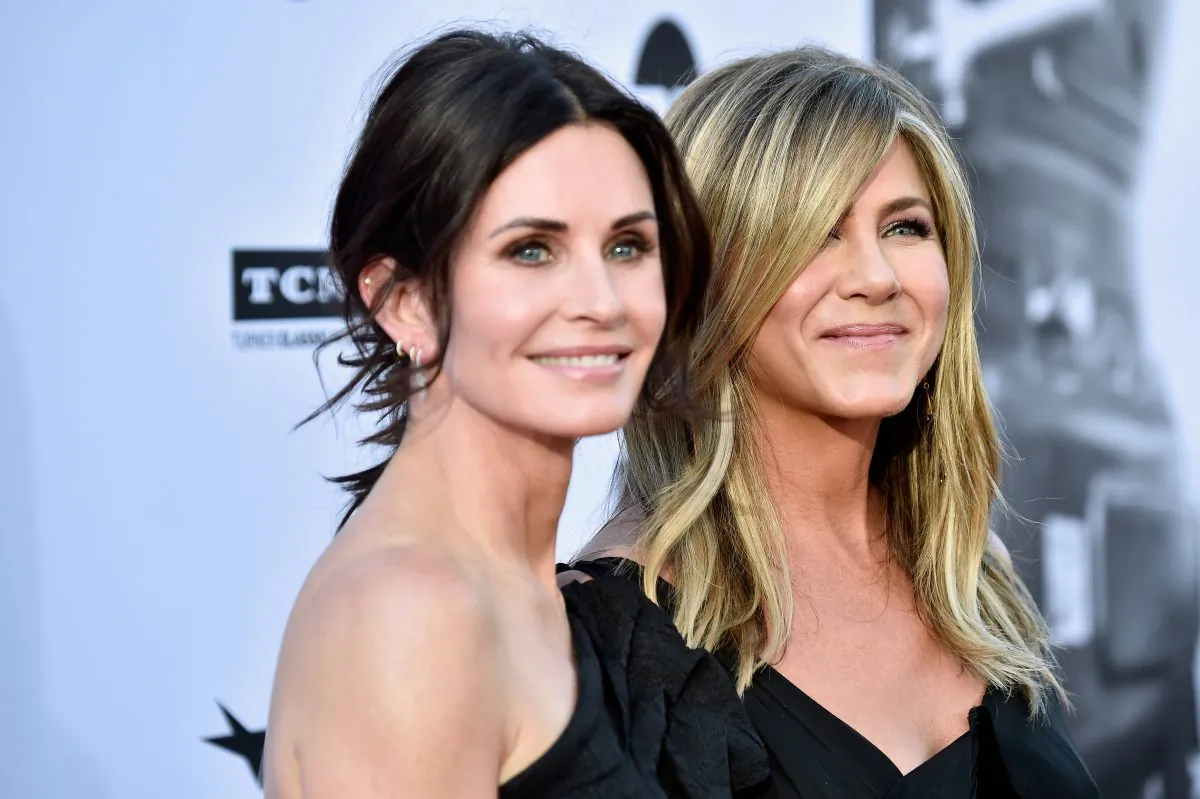 Courteney Cox (L) and Jennifer Aniston attend the American Film Institute's 46th Life Achievement Award Gala Tribute to George Clooney at Dolby Theatre in Hollywood, Calif., on June 7, 2018. (Frazer Harrison/Getty Images)