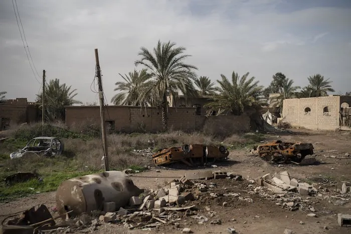 Damaged cars sit in an area recently retaken by U.S.-backed Syrian Democratic Forces (SDF) from ISIS terrorists in Susah, Syria, on Feb. 16, 2019. (Felipe Dana/AP Photo)