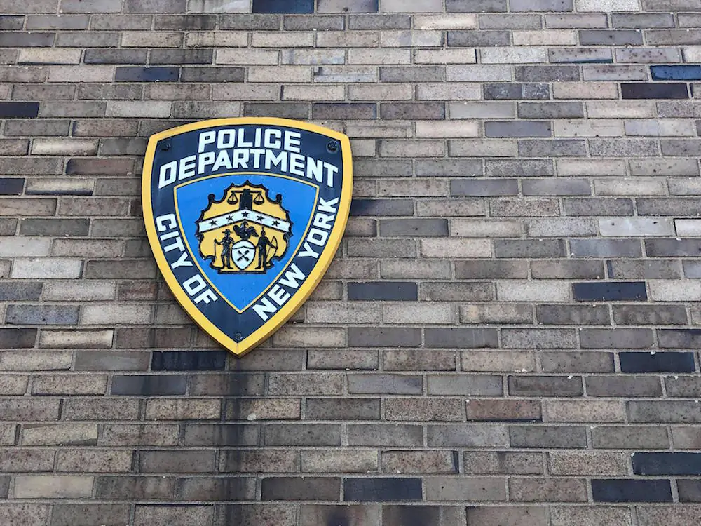 A logo of the New York Police Department in Brooklyn, New York, on Feb. 17, 2019. (Mimi Nguyen Ly/The Epoch Times)
