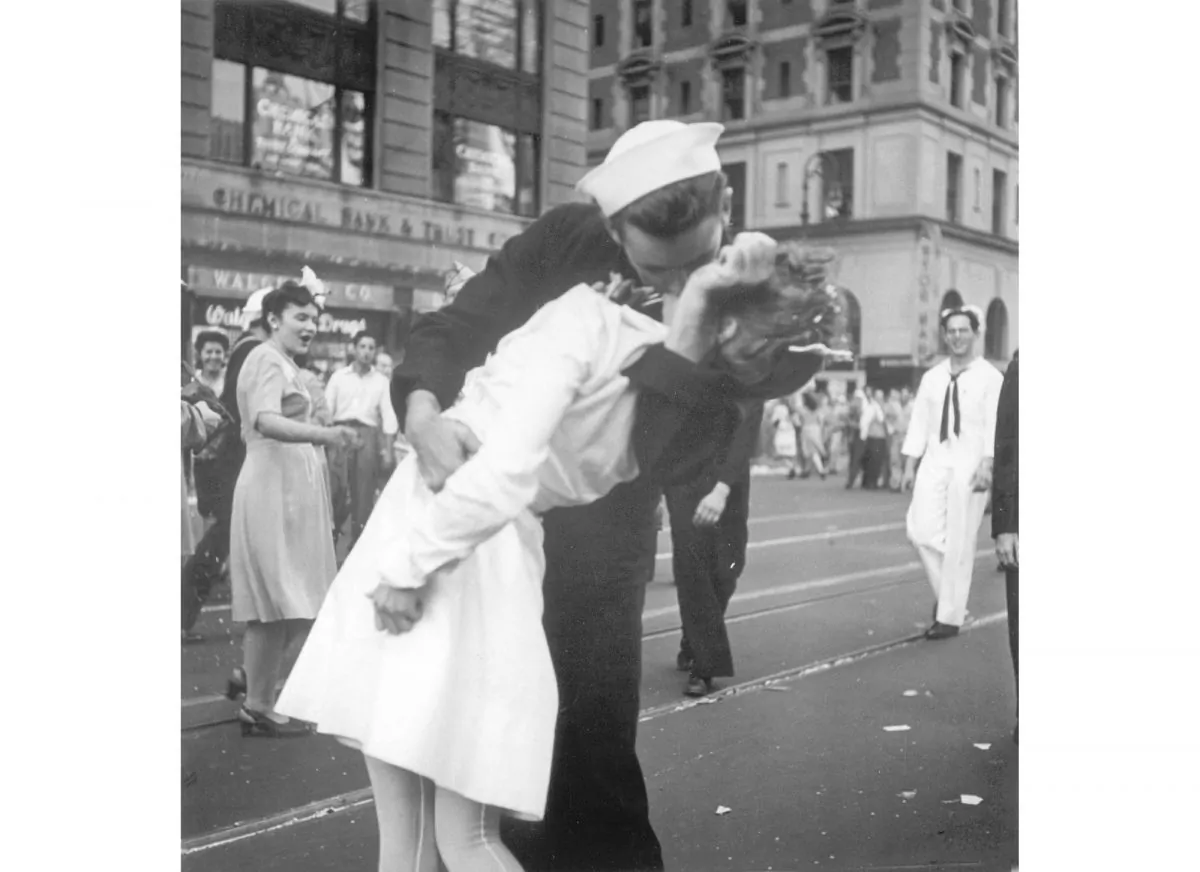 A sailor and a woman kiss in New York's Times Square, as people celebrate the end of World War II.  (Victor Jorgensen/U.S. Navy, File)