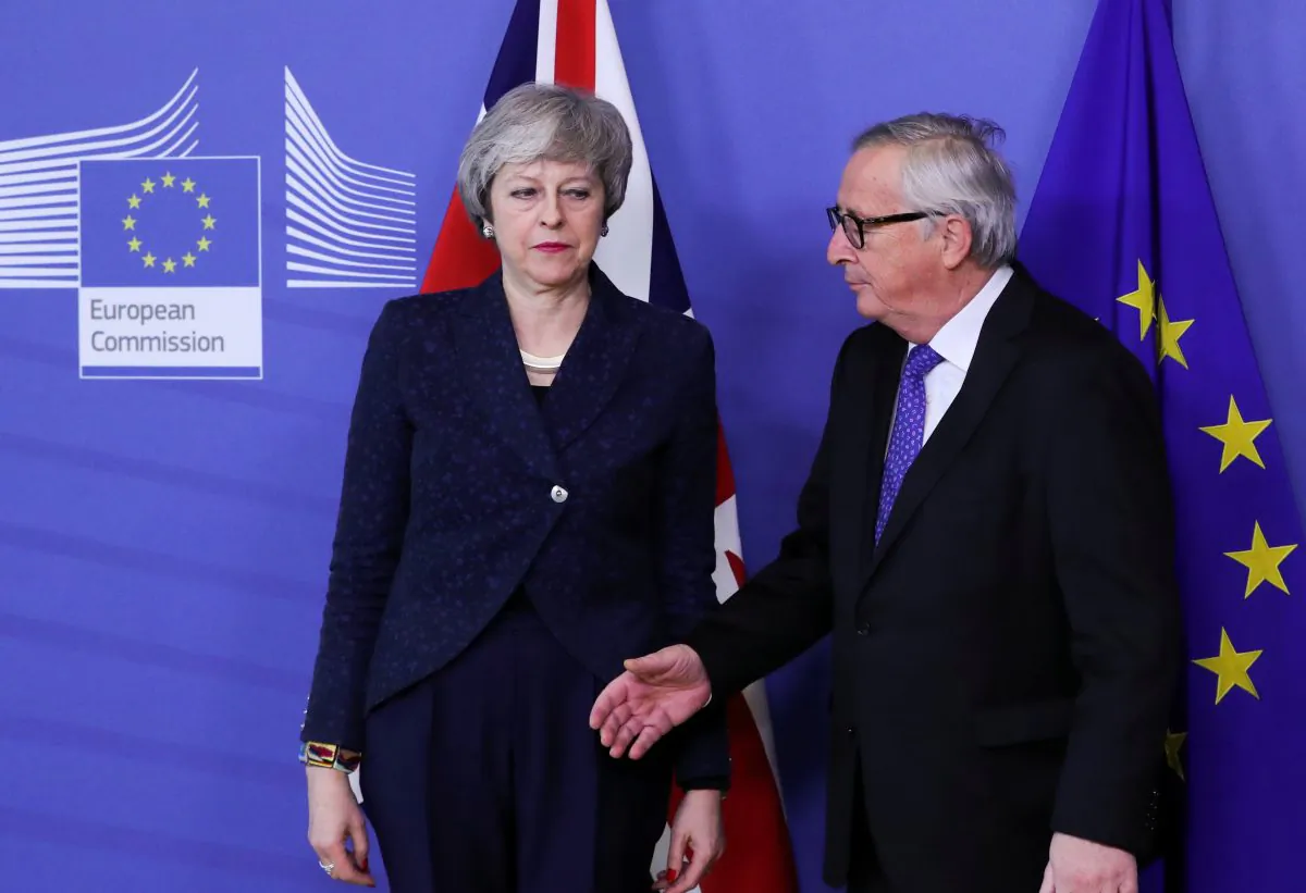 European Commission President Jean-Claude Juncker shakes hands with British Prime Minister Theresa May at the European Commission headquarters in Brussels, Belgium Feb. 7, 2019. (Yves Herman/Reuters)