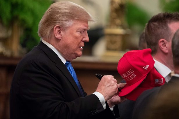 trump signs hats
