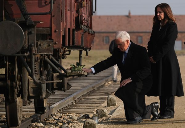 Vice President Mike Pence and Second Lady Karen Pence lay flowers