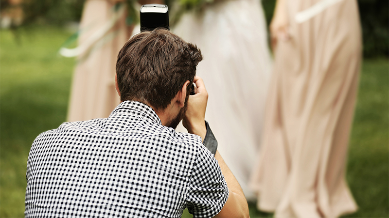 A wedding photographer (Illustration - Shutterstock)