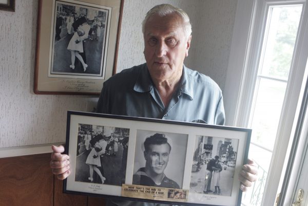 veteran holds iconic photo