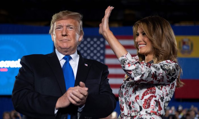 President Donald Trump and First Lady Melania Trump deliver remarks to the Venezuelan-American community in Miami, on Feb. 18, 2019. (Jim Watson/AFP/Getty Images)
