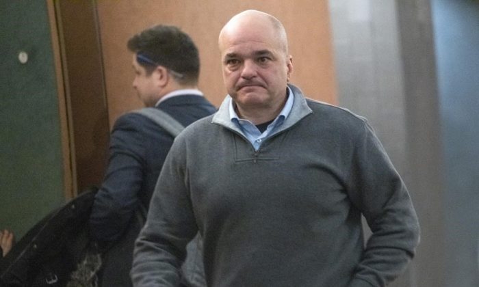 Former SNC-Lavalin vice-president Stephane Roy leaves a courtroom in Montreal on Feb. 13, 2019. (Paul Chiasson/The Canadian Press)