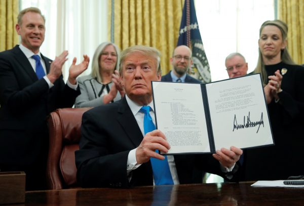 U.S. President Donald Trump displaus the "Space Policy Directive 4" after signing the directive establish a Space Force