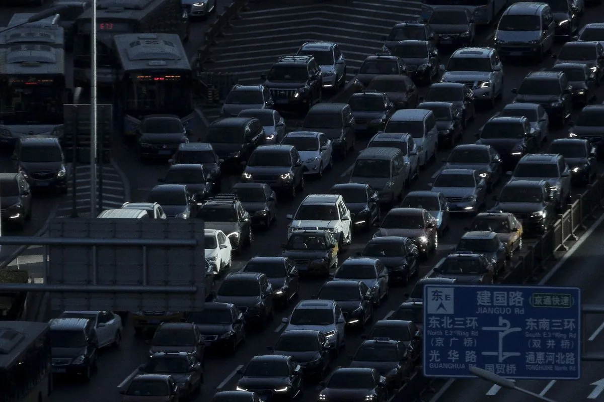 Heavy traffic during the morning rush hour in Beijing on Dec. 11, 2018. China’s auto sales fell for an eighth month in January 2019, extending a painful decline for the biggest global market. (Andy Wong/AP)