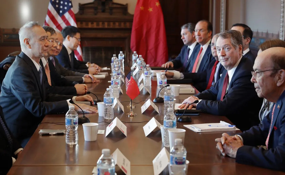 Commerce Secretary Wilbur Ross (1st R), U.S. Trade Representative Robert Lighthizer (2nd R), and other U.S. officials meet with Chinese Vice Premier Liu He (1st L), Central Bank Governor Yi Gang (2nd L), and other Chinese officials in Washington, D.C., on Jan. 30, 2019. (Chip Somodevilla/Getty Images)