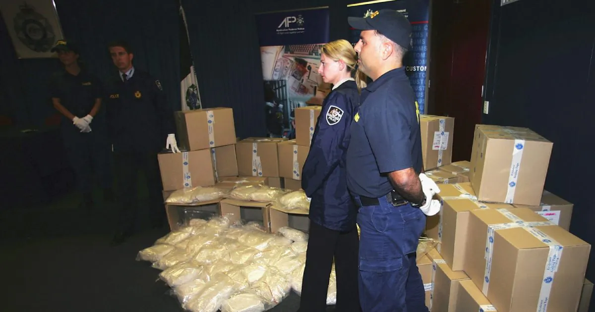 Australian Federal Police display more than one tonne of MDMA (ecstasy) tablets seized from Melbourne's waterfront at the Australian Federal Police Headquarters April 15, 2005 in Melbourne, Australia. The seizure, which has an approximate street value of $250 million, is Australia's largest and one of the worlds biggest ever single detections of the street-ready drug. (Sean Garnsworthy/Getty Images)