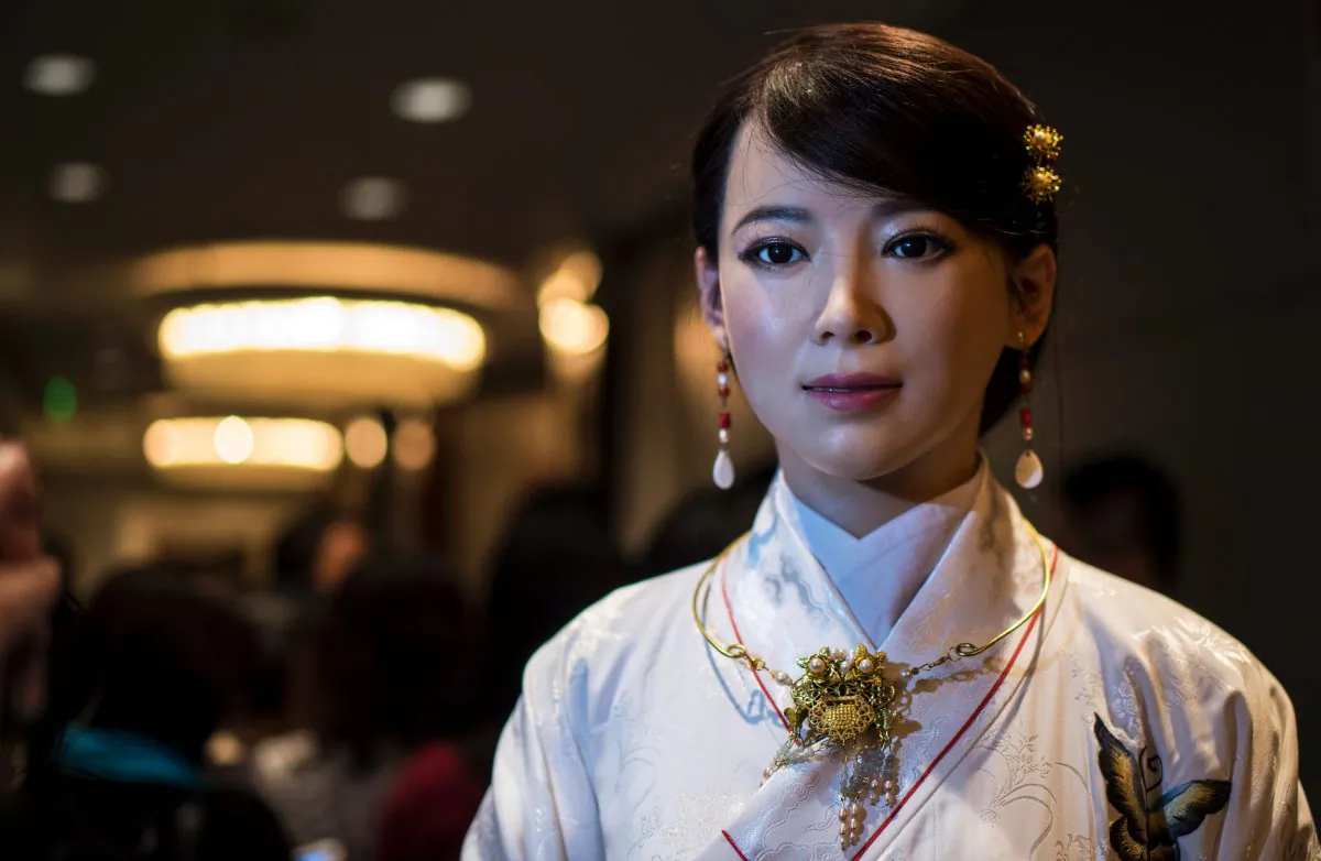 Humanoid robot Jia Jia, created by a team of engineers from the University of Science and Technology of China, is pictured following a presentation at a conference in Shanghai on Jan. 9, 2017. "Jia Jia" can hold a simple conversation and make specific facial expressions.  (Johannes Eisele/AFP/Getty Images)