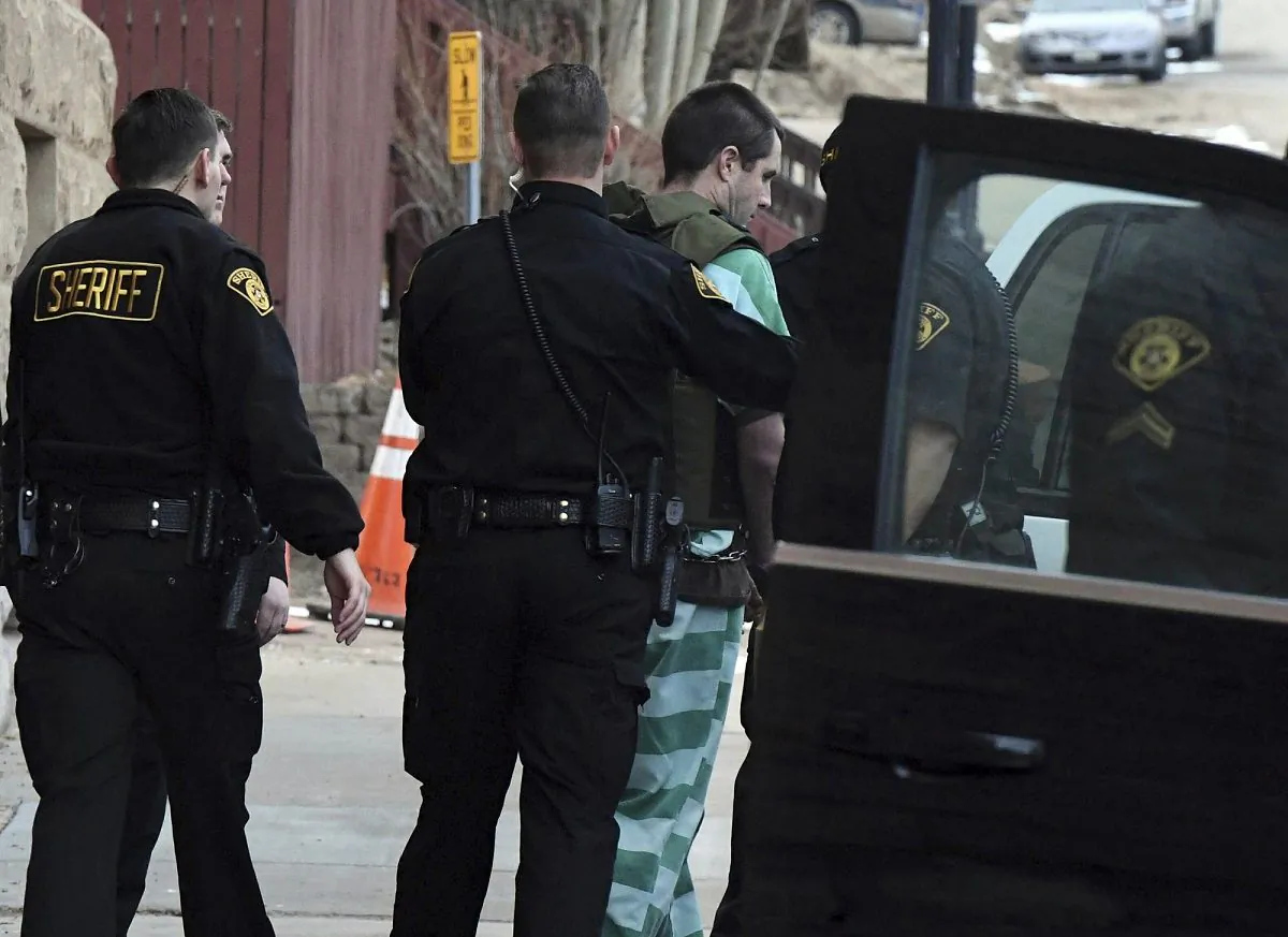 Patrick Frazee is escorted to an awaiting SUV after a hearing at the Teller County Courthouse in Cripple Creek, Colo., on  Feb. 19, 2019. (Jerilee Bennett/The Gazette via AP)