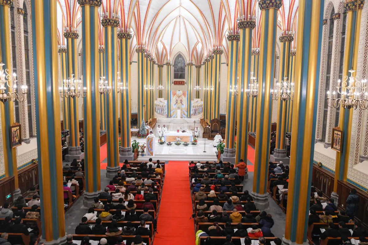 Chinese worshippers attend a mass during the Christmas Eve at a Catholic church in Beijing on Dec. 24, 2018. (Wang Zhao/AFP/Getty Images)