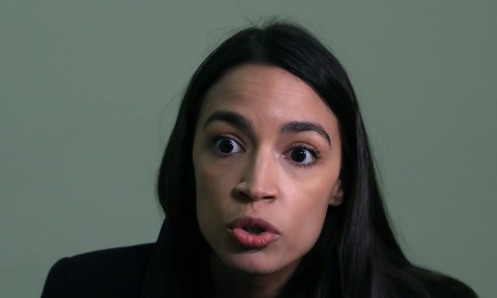 Rep. Alexandria Ocasio-Cortez speaks to the media about Amazon scrapping its plans to build a new headquarters in Queens, New York, on Capitol Hill on Feb. 14, 2019. (Mark Wilson/Getty Images)