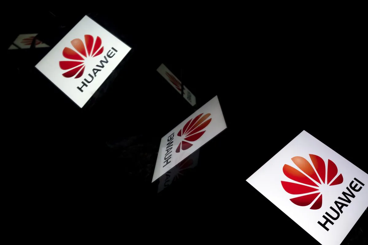 This illustration picture shows the Chinese multinational telecommunications manufacturer Huawei logo displayed on a tablet in Paris on February 18, 2019. (LIONEL BONAVENTURE/AFP/Getty Images)