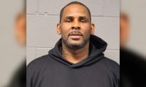 Pictured: R. Kelly in Mugshot After Surrendering to Police on Sexual Abuse Charges