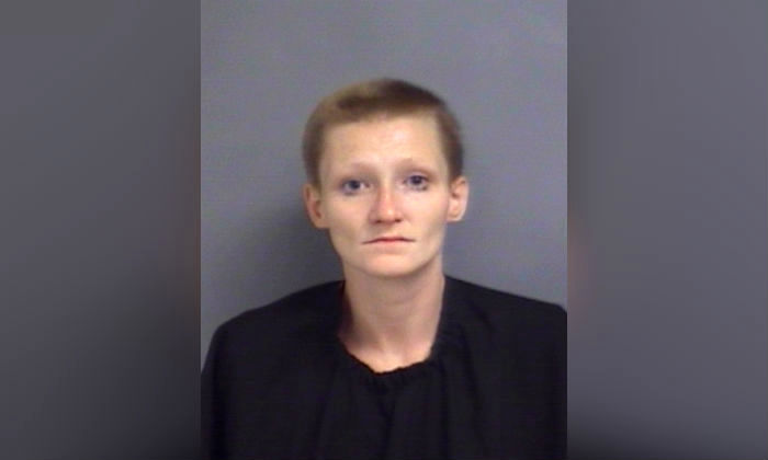 Savannah Rhinehart, 25, was charged with child neglect, burglary and petit larceny when she broke into a man's home on in Feb. 14, 2019. (countyofunion.org)