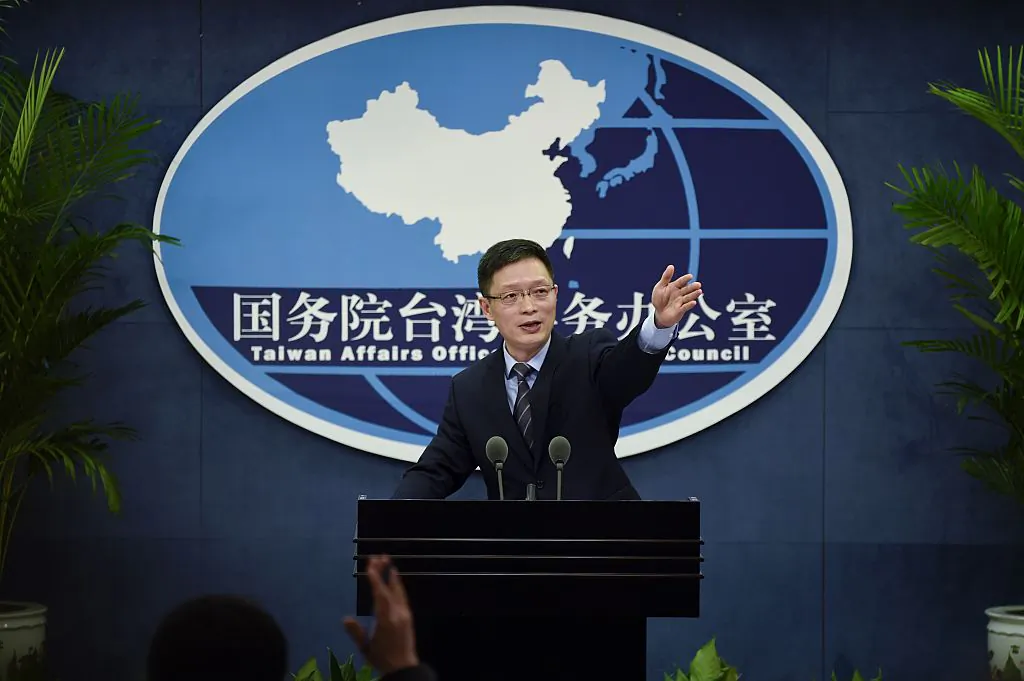 An Fengshan, spokesman for the State Council's Taiwan Affairs Office, gestures toward the media at a press conference in Beijing on Dec. 28, 2016. (Wang Zhao/AFP/Getty Images)