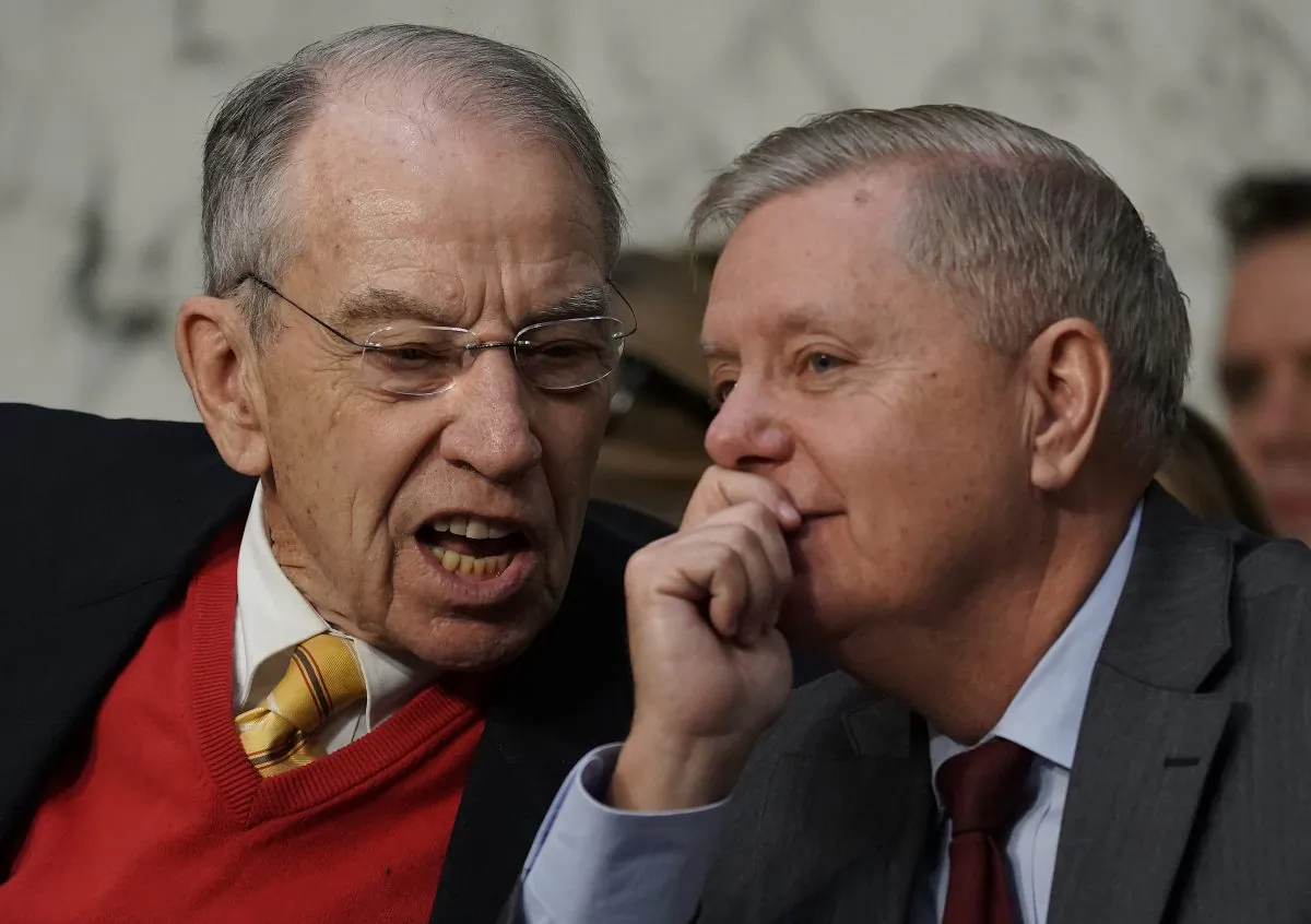 Senate Judiciary Committee Chairman Lindsey Graham (R) (R-S.C.) confers with former committee chairman Sen. Chuck Grassley (L) (R-IA) during a committee hearing in Washington on Jan. 15, 2019. (Alex Wong/Getty Images)
