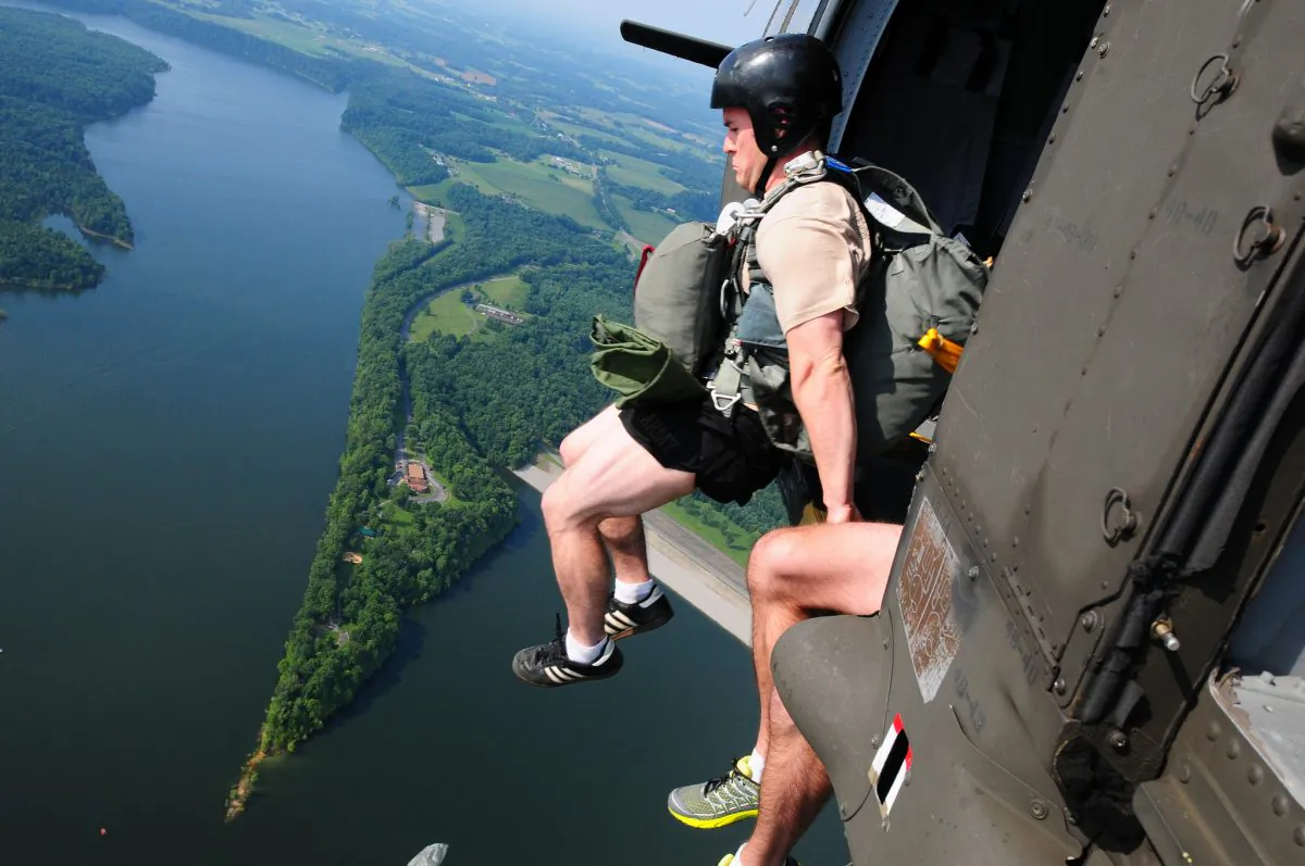 Soldiers of the 20th Special Forces Group conduct a deliberate water airborne jump over Green River Lake near Cambellsville, Ky., July 13, 2013. (U.S. Army National Guard photo by Staff Sgt. Scott Raymond)