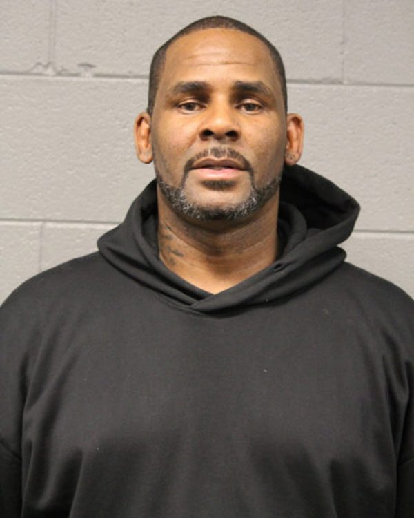 R&B singer R. Kelly is photographed during booking at a police station