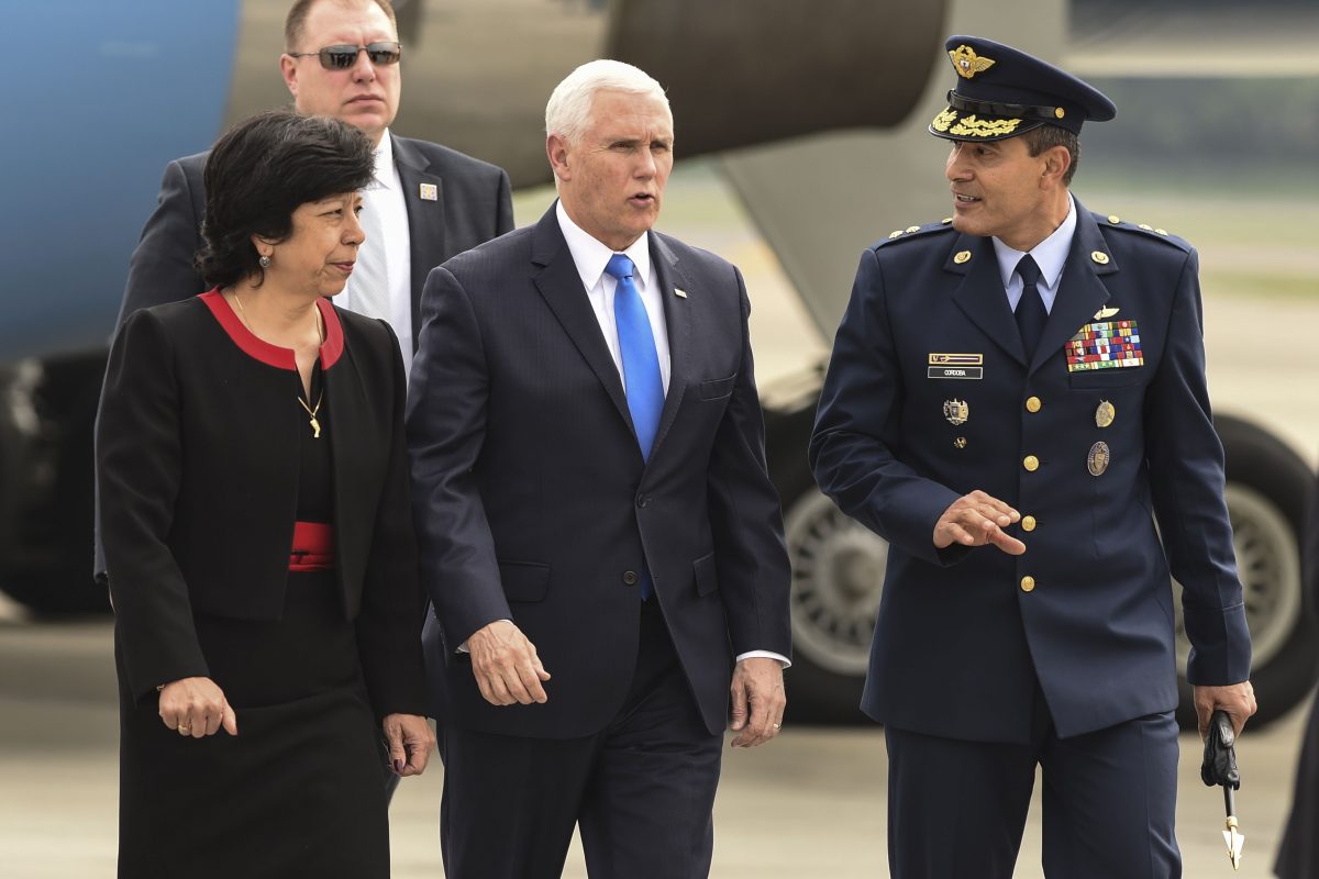 US Vice President Mike Pence (C) is welcomed by Colombia's Foreign Affairs Vice Minister