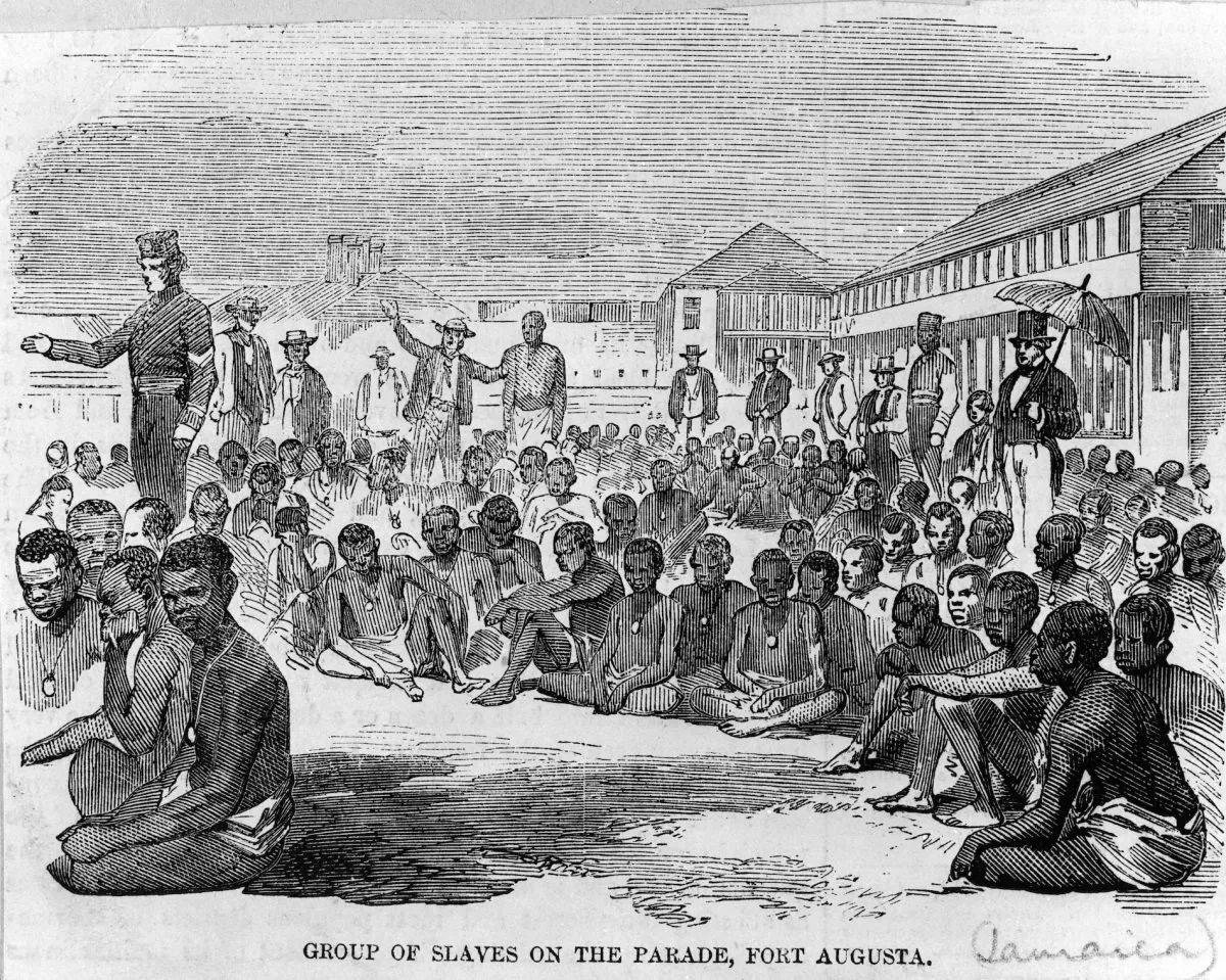 A group of liberated slaves at Fort Augusta, Jamaica, in 1857, after the slave ship they were imprisoned in was captured by an English destroyer. (HultonArchive/Illustrated London News/Getty Images)