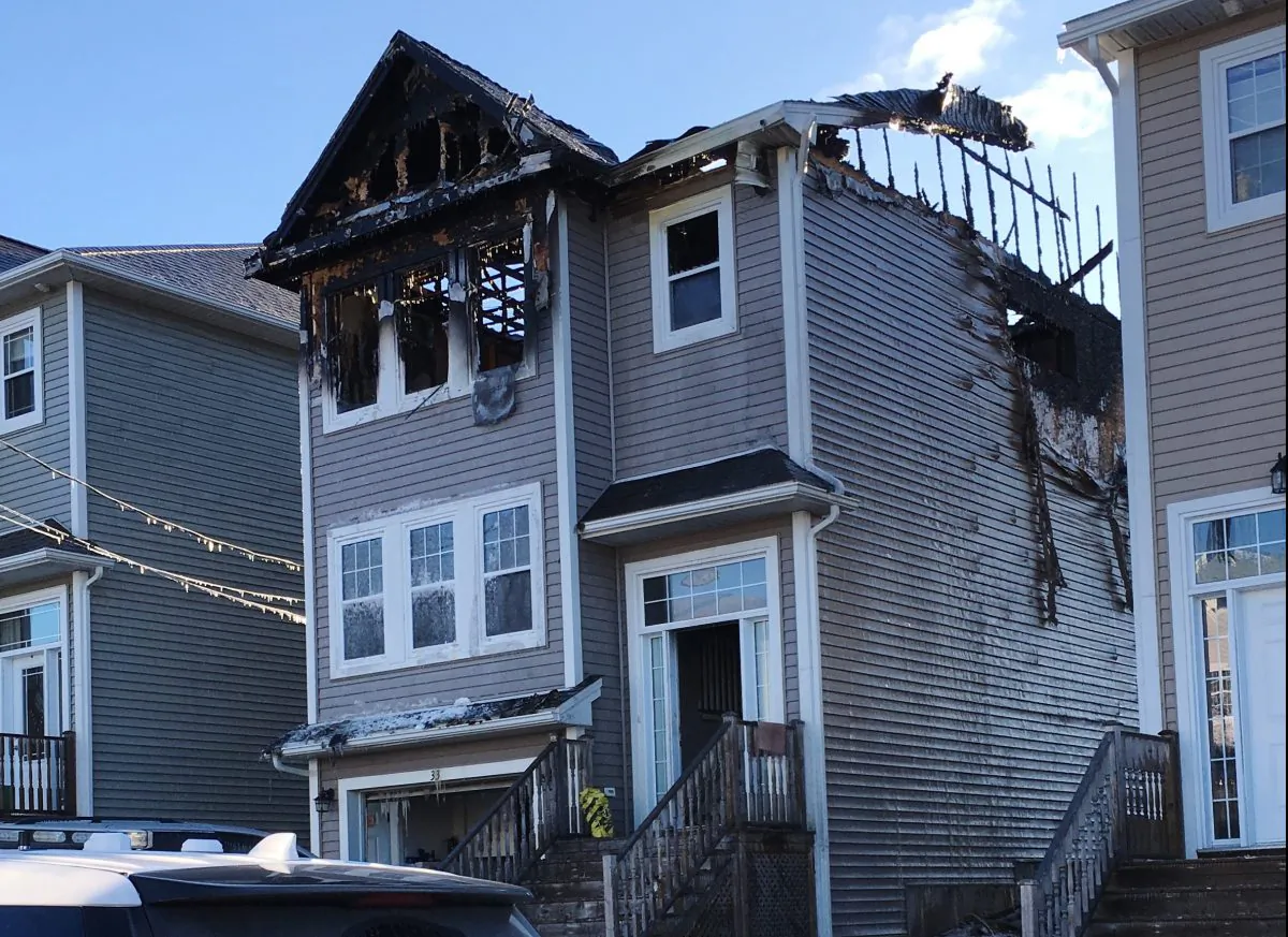 The aftermath of a house fire is seen in the Spryfield community in Halifax on Feb. 19, 2019. (Rob Roberts/The Canadian Press)