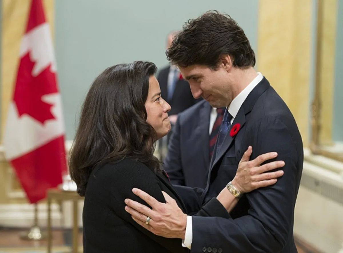 Canadian Prime Minister Justin Trudeau speaks with Minister of Justice Jody Wilson-Raybould during a swearing-in ceremony at Rideau Hall in Ottawa, on Nov. 4, 2015. (Adrian Wyld/AFP/Getty Images)