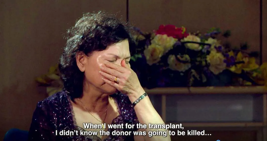 Taiwanese resident Xiusong Tu as she talks about her transplant surgery in China in the documentary “Human Harvest.” (Courtesy "Human Harvest" documentary)