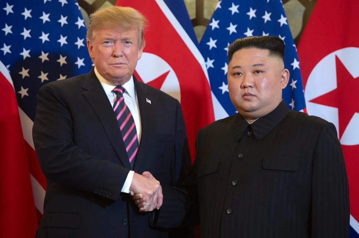 President Donald Trump shakes hands with North Korea's leader Kim Jong Un before a meeting at the Sofitel Legend Metropole hotel in Hanoi on Feb. 27, 2019. (SAUL LOEB/AFP/Getty Images)