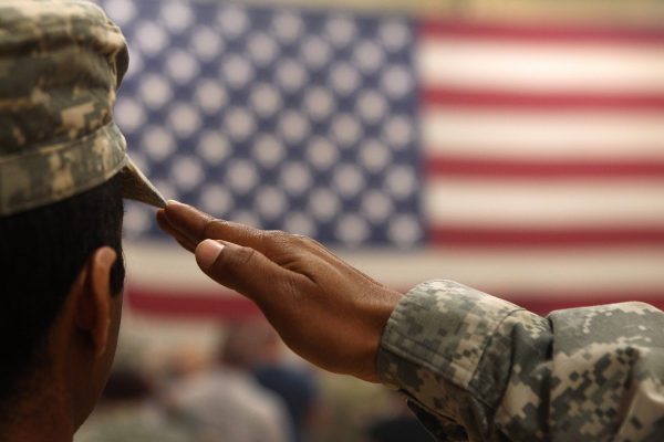 Soldier salute flag