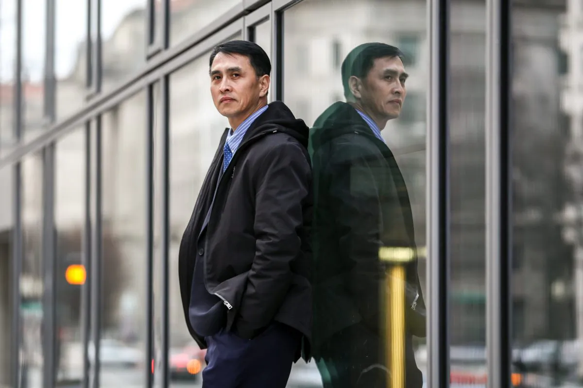 Businessman Yu Ming in Washington on Feb. 19, 2019. He arrived in the United States to join his wife, daughter, and son in January 2019 through the help of the U.S. government, after being imprisoned for 12 years and tortured nearly to death in labor camps in China for his belief in Falun Gong. (Samira Bouaou/The Epoch Times)