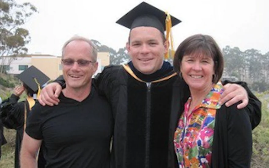 Shane Todd with his parents Rich Todd (L) and Mary Todd (R) on his being awarded a doctorate in mechanical engineering. (Courtesy the Todd family)