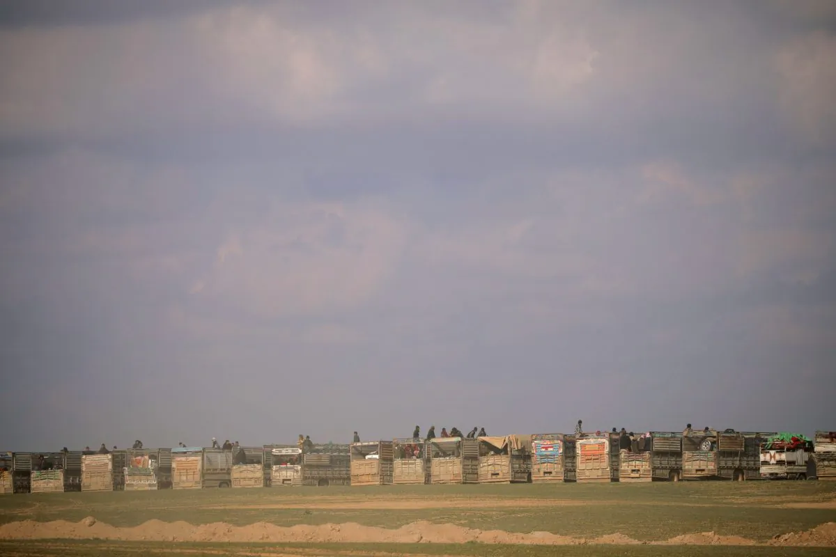 Buses that carry civilians are seen parked near Baghouz, Deir Al Zor province, Syria Feb. 11, 2019.   (REUTERS/Rodi Said/File Photo)