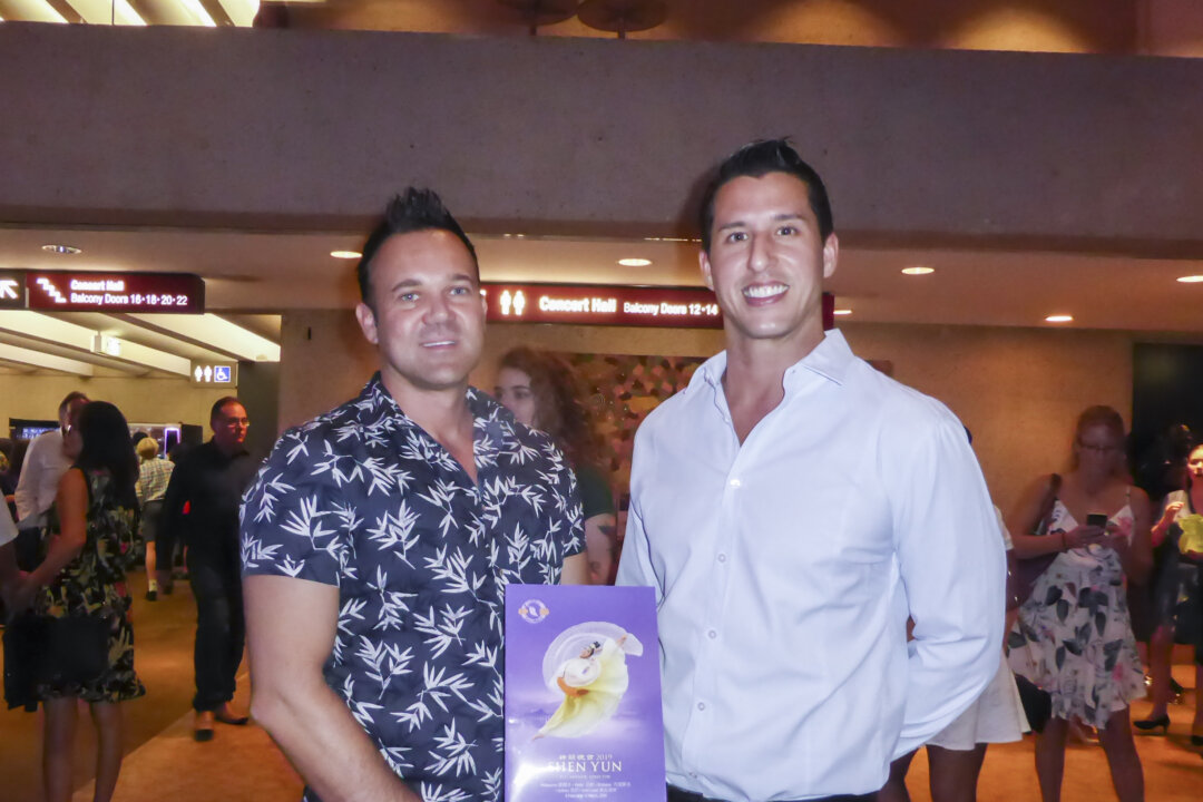 Former professional dancer Karlos Velasco (R) and executive concierge Brendon Crane (L) saw Shen Yun at Brisbane's Queensland Performing Arts Centre, in Australia, on Feb. 27, 2019. (Mary Yuan/The Epoch Times)