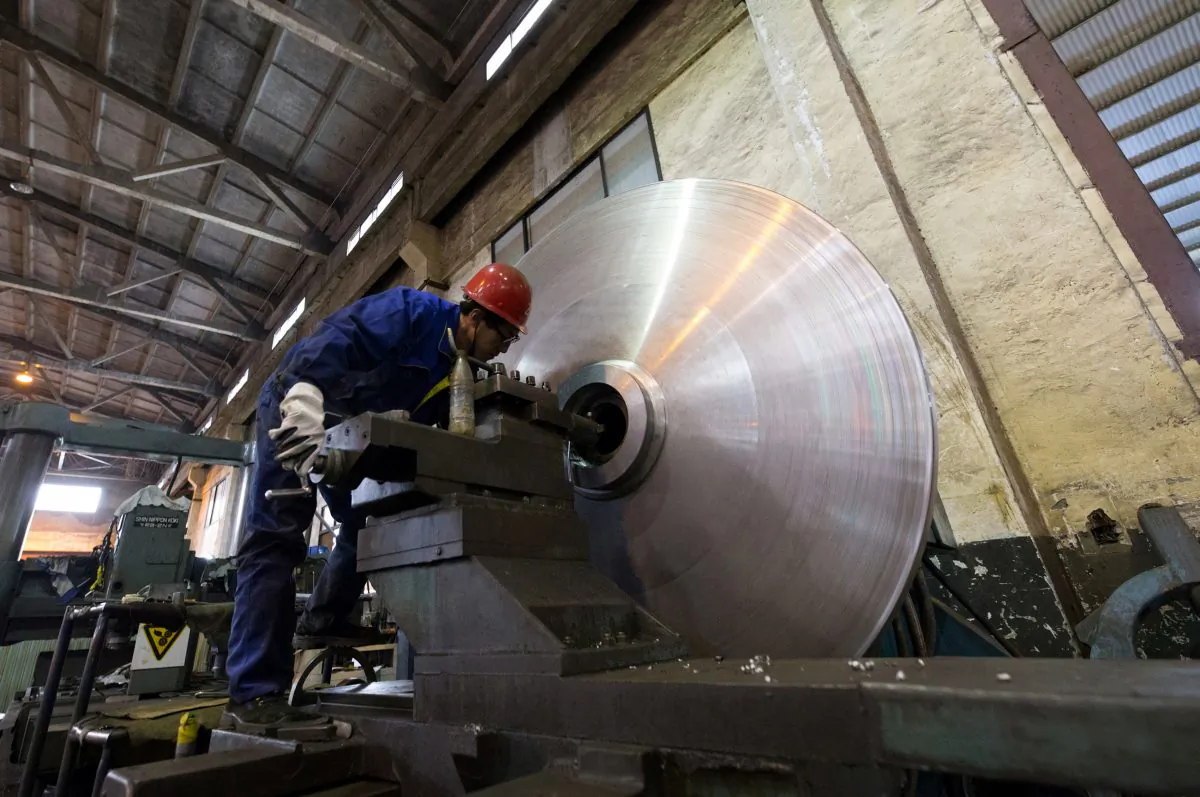 A man works at a workshop of a machinery manufacturing company in Nanjing, Jiangsu Province, China on Dec. 7, 2018. (Reuters)